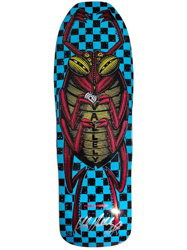 Skateboard deck with a blue and black checkerboard background and a large red scorpion illustration; text runs along the scorpion's body.